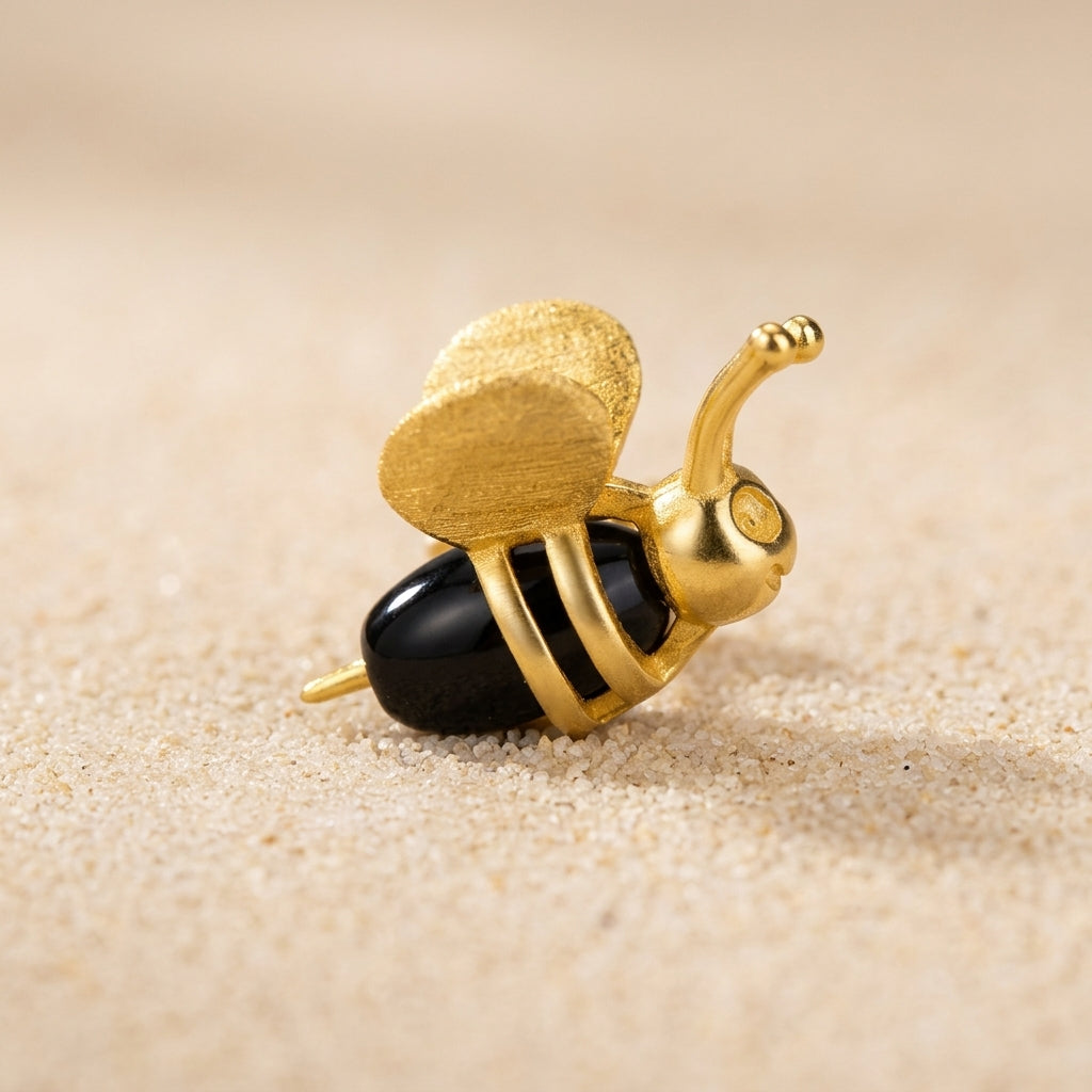mismatched set with the 3D bee on one ear and the melting honey drip on the other to show the trendy asymmetrical fit