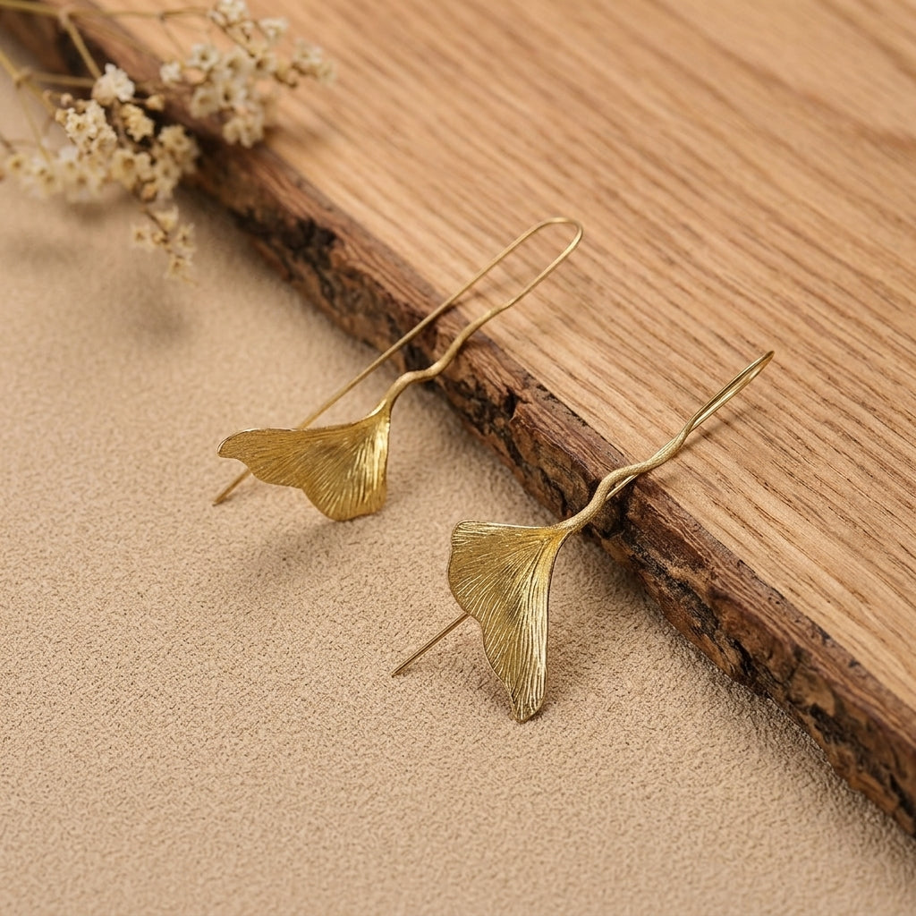 Vintage-style gold Ginkgo leaf dangle earrings, hypoallergenic jewelry for sensitive ears