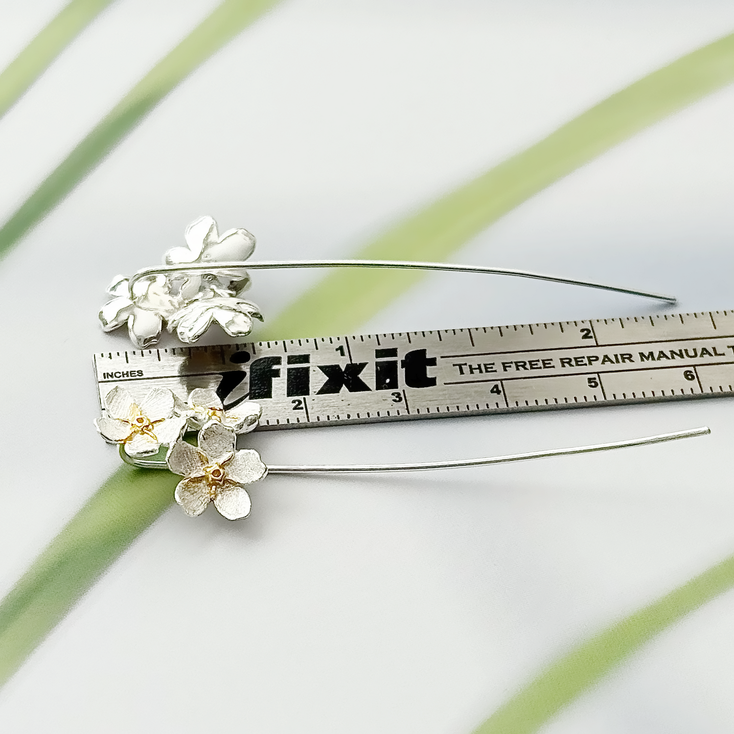 Long silver flower earrings