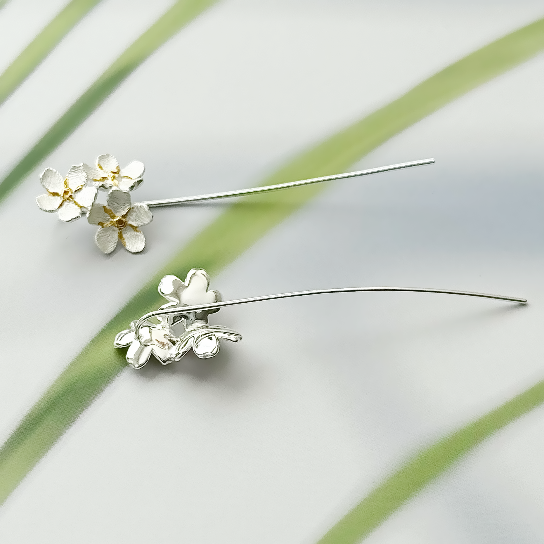 Stem style sterling silver earrings