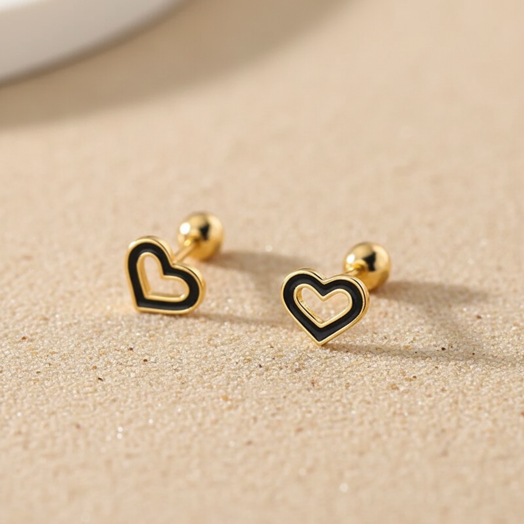 Romantic heart-shaped jewelry gift: gold-plated sterling silver studs with comfortable screw-back closure.