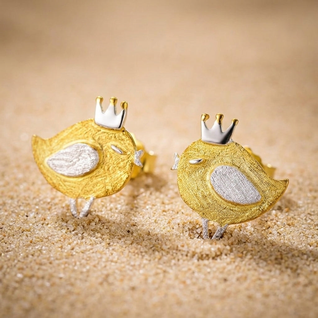 Dainty 18kt gold plated bird earrings featuring a polished finish and realistic small bird silhouette for everyday wea