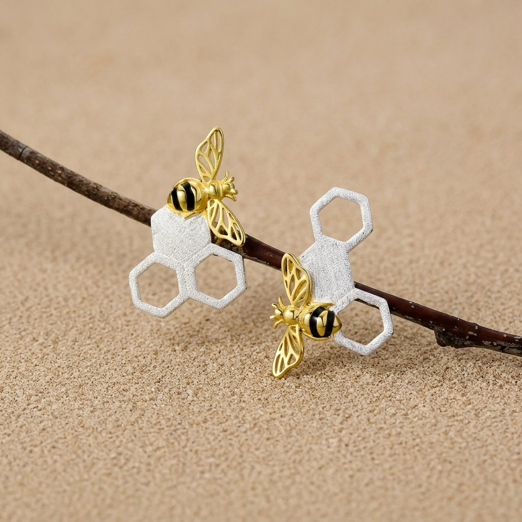 Back view of sterling silver bee stud earrings showing secure butterfly backings and "925" quality hallmark stamp