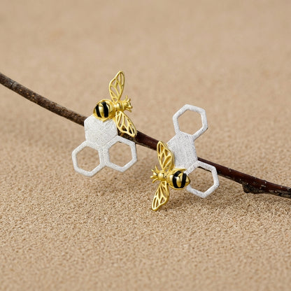 Back view of sterling silver bee stud earrings showing secure butterfly backings and "925" quality hallmark stamp
