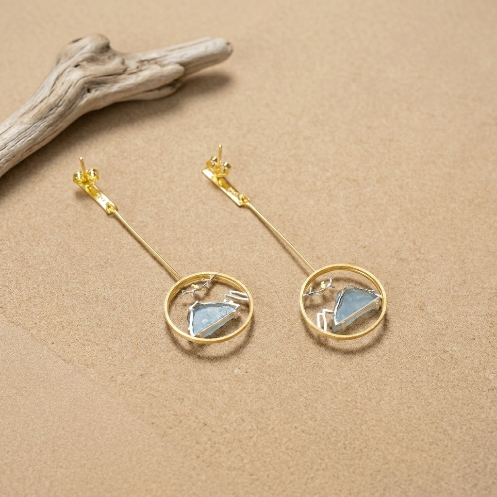 Long gold-plated mountain landscape earrings with bird charms, designed for women who love hiking and the outdoors