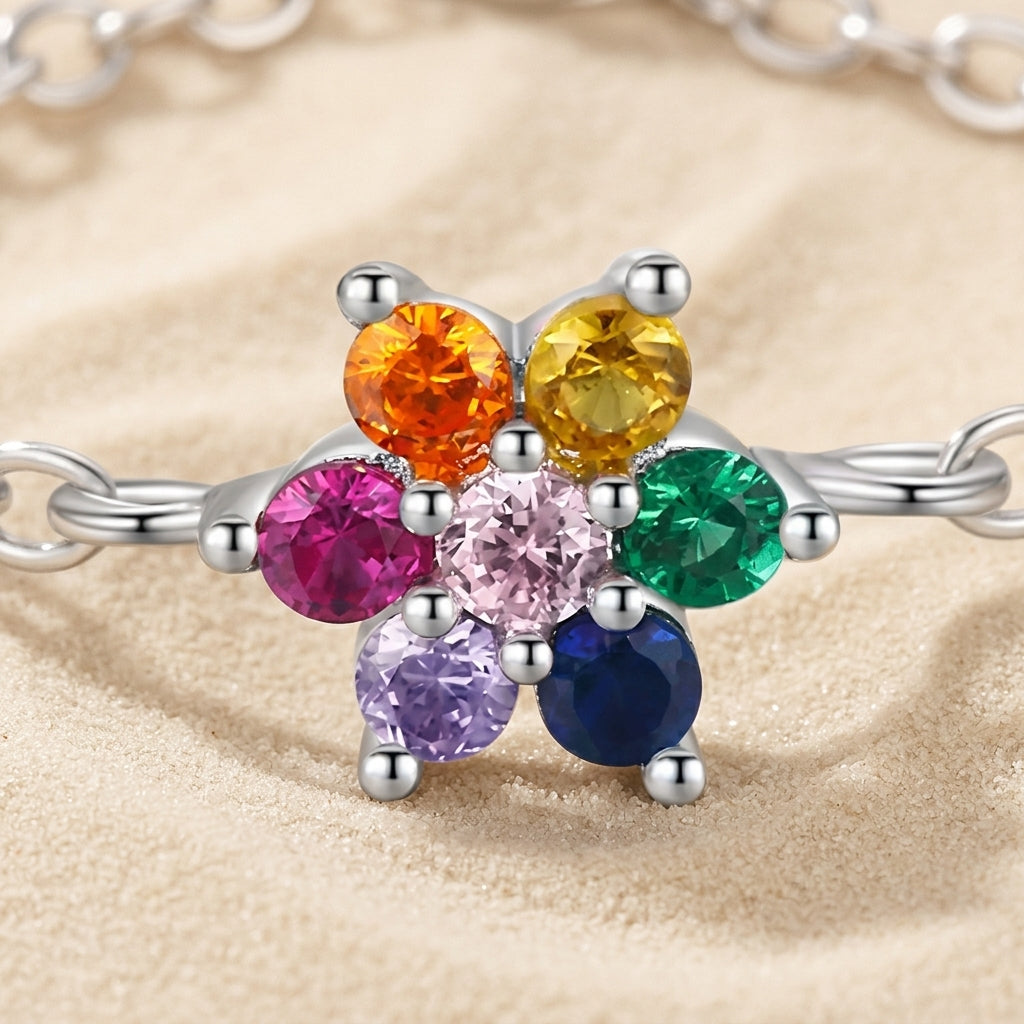 Dainty botanical chain ring with a rainbow Zirconia flower, minimalist adjustable jewelry for stacking and daily wear.