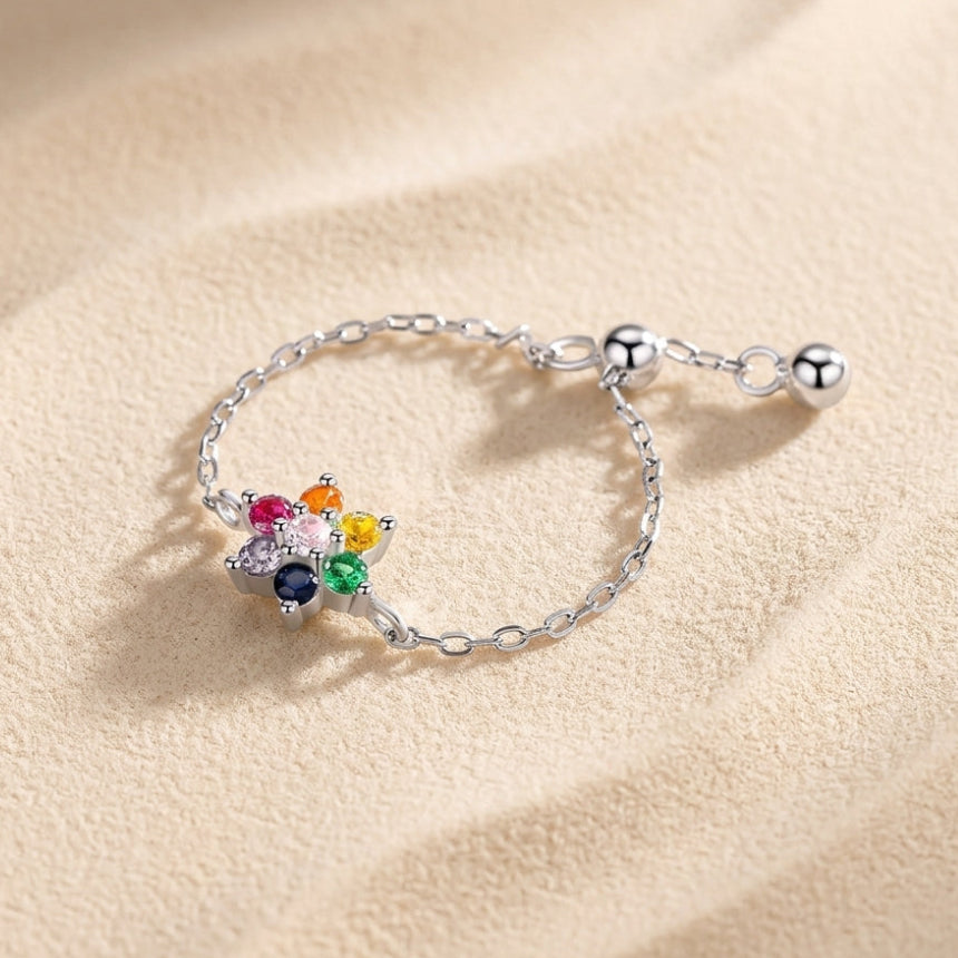 Sparkling flower-shaped ring in 925 sterling silver, hand-set with vibrant, multi-colored Zirconia gemstones