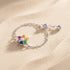 Sparkling flower-shaped ring in 925 sterling silver, hand-set with vibrant, multi-colored Zirconia gemstones
