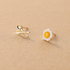 Sterling silver fried egg and cutlery stud earrings with 18k gold plating and white enamel.