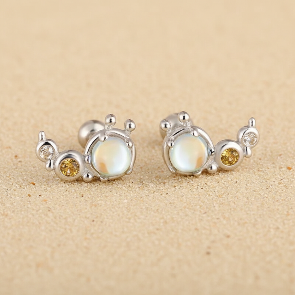 Sterling silver caterpillar stud earrings with yellow zircons and opal stones, featuring secure ball screw backs