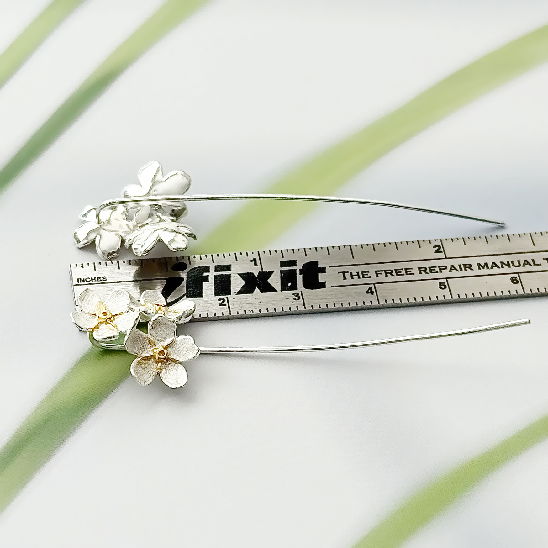 Long silver flower earrings 