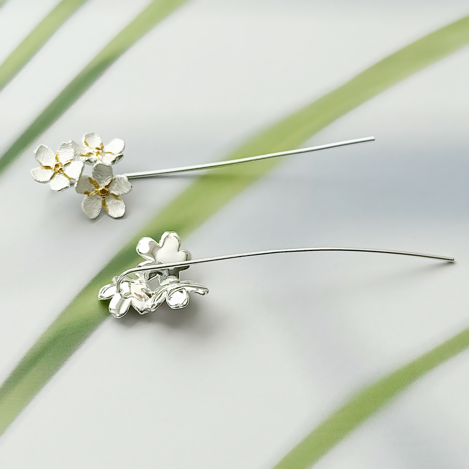 Stem style sterling silver earrings 