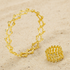 Adjustable wrap ring in gold-plated finish with a fluid spiral coil design