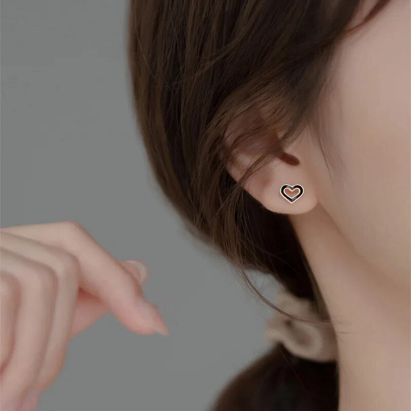 Heart stud gold earring view