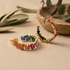 Iris rainbow baguette hoop earrings in 18kt gold by Juweries