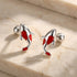 Silver fish earrings