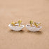 Miniature sterling silver plant pot earrings with 18kt gold plated leaf accents and intricate garden-themed details
