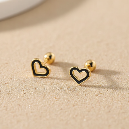 Romantic heart-shaped jewelry gift: gold-plated sterling silver studs with comfortable screw-back closure.