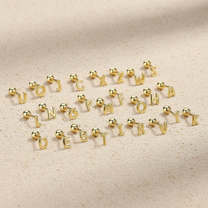 Personalized gold alphabet stud earrings, sterling silver initial jewelry with secure screw backs for kids and adults.
