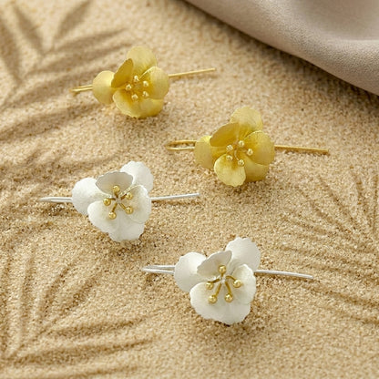 long silver flower drop earrings for an elegant, nature-inspired wedding or party look