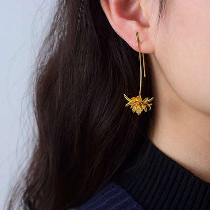 lotus dangle gold earrings view