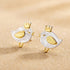 Small gold bird earrings in festive holiday packaging, making a perfect Christmas stocking filler or secret santa gift for women