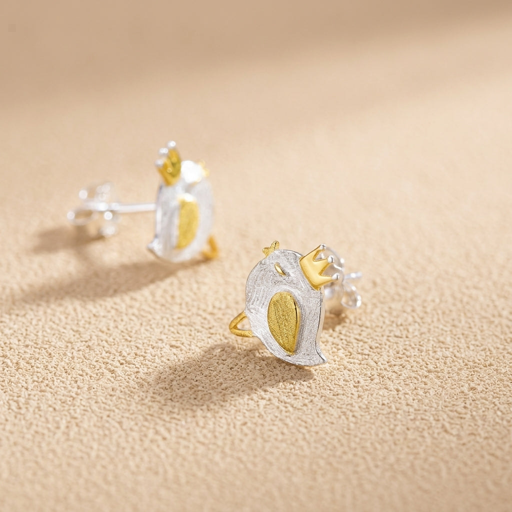 Tiny sterling silver bird stud earrings in a minimalist sparrow design, handcrafted from high-quality 925 silver